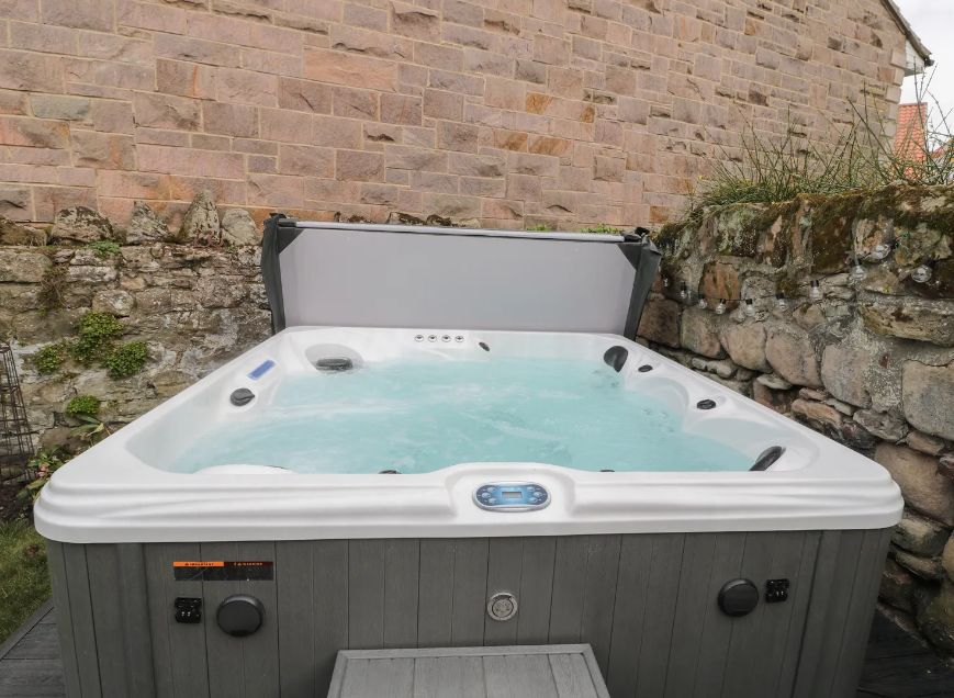 This cottage has a large private hot tub