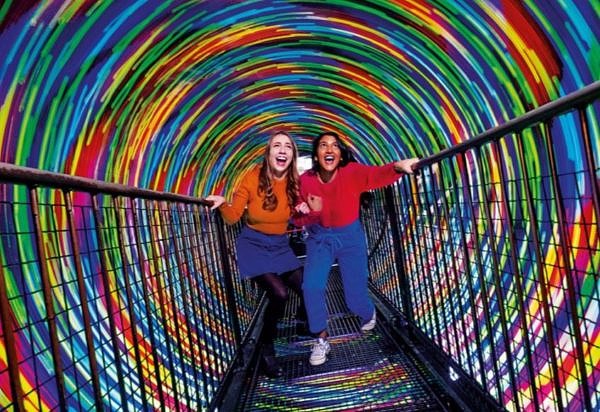 Ladies having fun inside Camera Obscura and World of Illusions