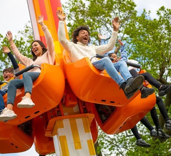People enjoying the fire and ice freefall ride at Legoland