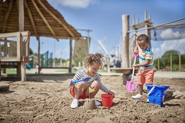 kids playing on the sand