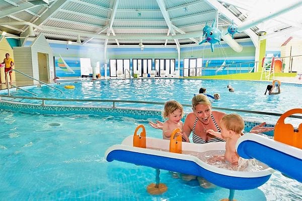 mom with kids at swimming pool