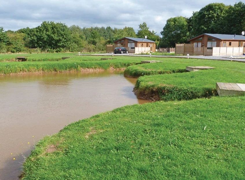 Colliery Lane Lodges overlook the fishing lake and have private hot tubs