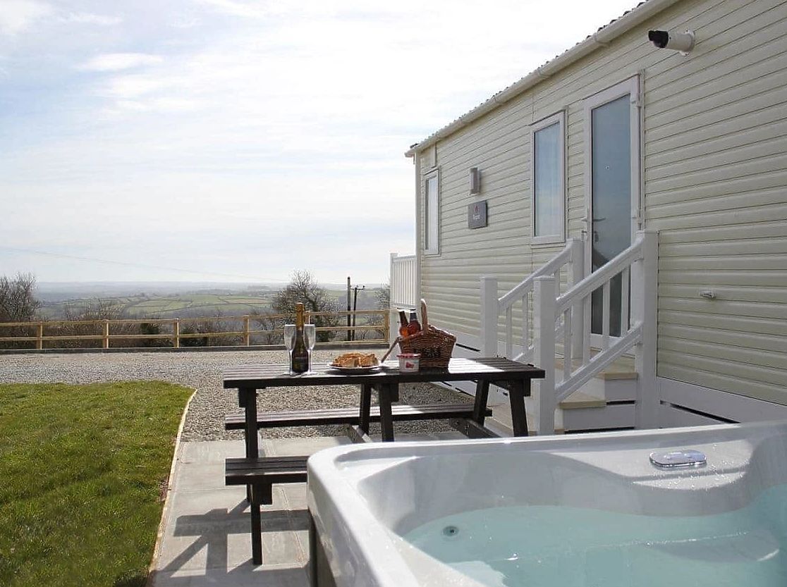 Enjoy fab views from your private hot tub